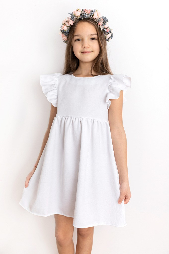 Sukienki na komunię dla dziewczynek - na co zwrócić uwagę przy zakupie?